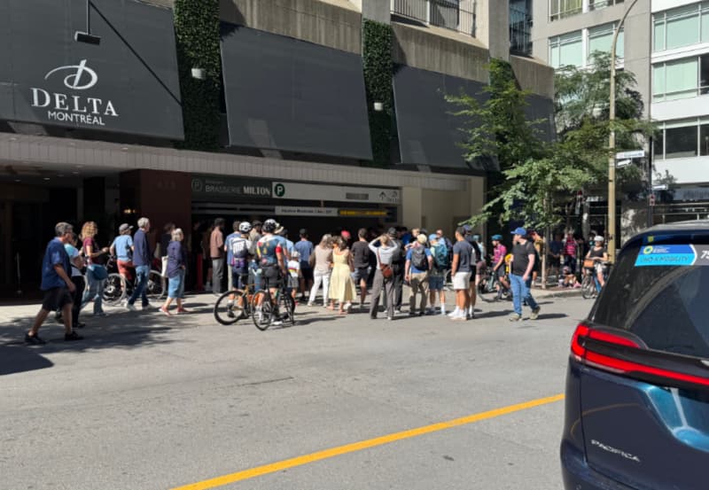 Cycling fans gathering outside the team hotel in Montreal